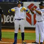 Grand slam de Aldrem Corredor lideró paliza de Leones sobre Águilas